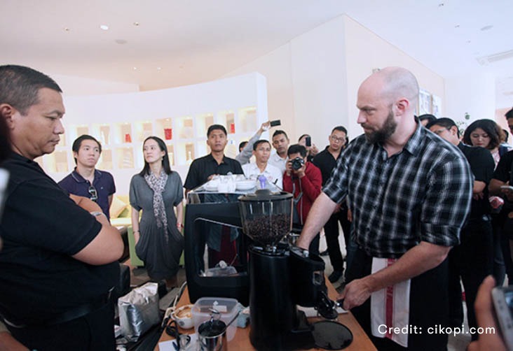 World Barista Champion with Coffee Beans and Tea Leaves